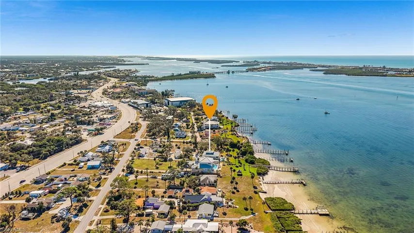 Aerial view of residential area with a large body of water