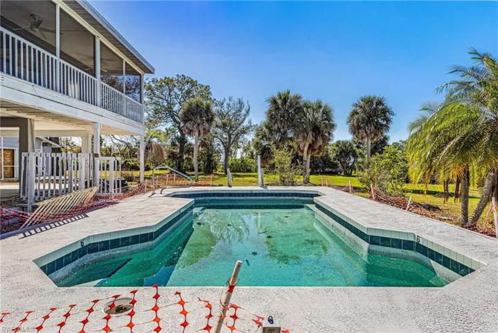 Outdoor pool with a patio area
