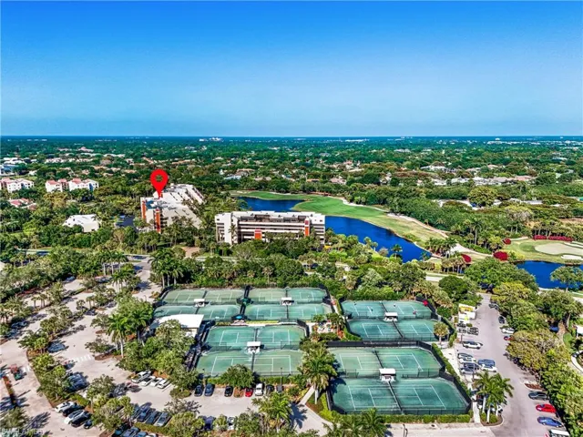 Prime location with close proximity to Pelican Bay Foundation tennis courts and surrounding amenities.