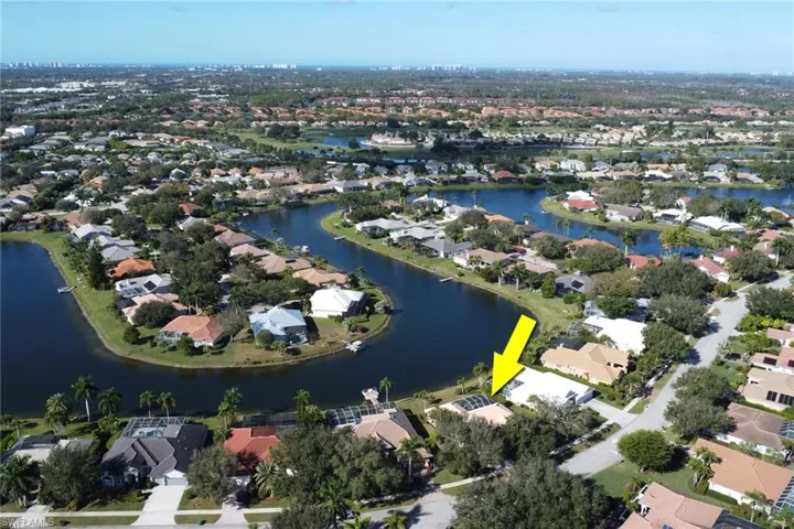View of property location featuring nearby suburban area and a large body of water