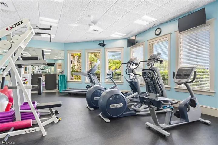 Workout area featuring a paneled ceiling