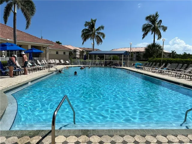 Community pool featuring the Tiki Bar with great food