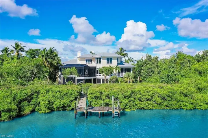Rear view of house featuring a water view