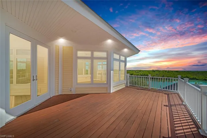 View of deck at dusk