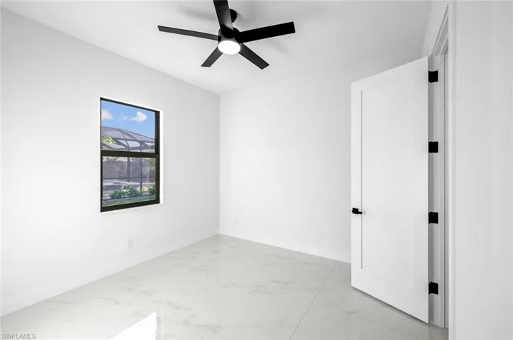 Spare room featuring ceiling fan