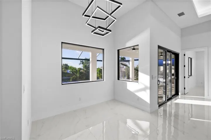 Spare room with ceiling fan