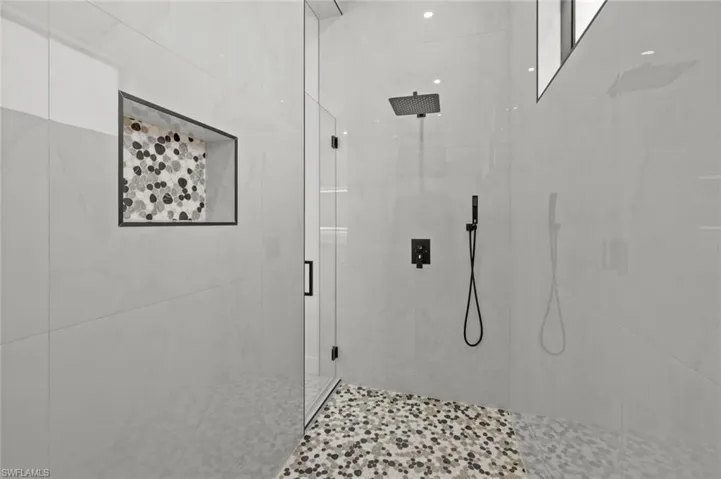 Bathroom with an enclosed shower