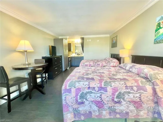 Bedroom with ornamental molding