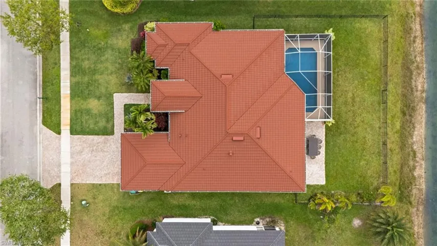 Drone / aerial view. Beautiful NEW 2024 stone-coat STEEL roof.