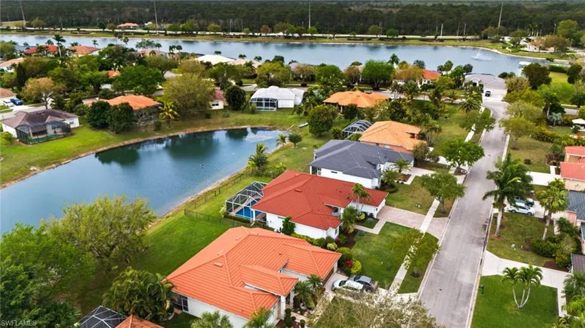 Aerial view featuring a water view and a residential view on a CUL-DE-SAC.