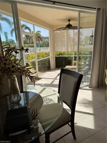 Sunroom featuring ceiling fan
