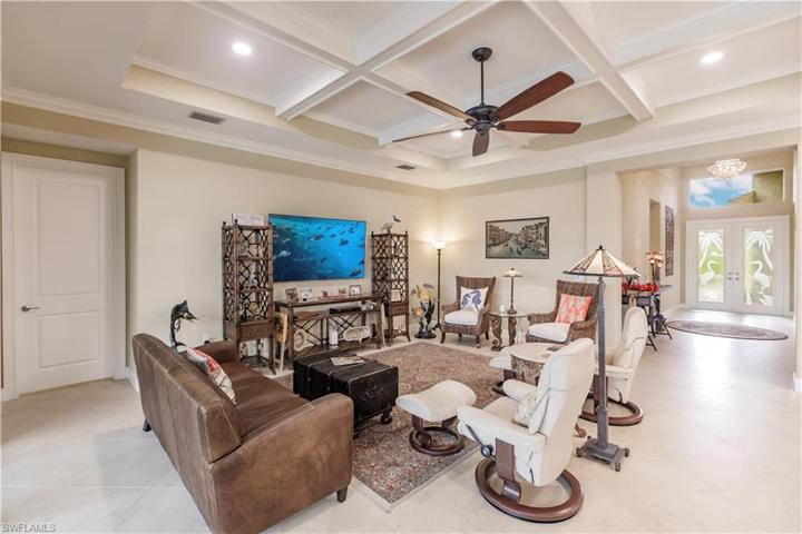 You will be drawn into this home through the wide foyer entry.  My wife looks for an unobstructed view from the front door all the way through to the pool before she goes any further in a home search.  This home passes the test!