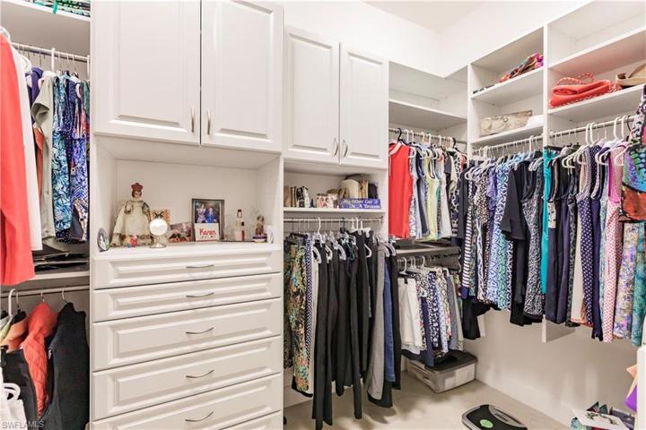 Well appointed closet with loads of space to hand, shelve, or tuck away.  How cool is this?