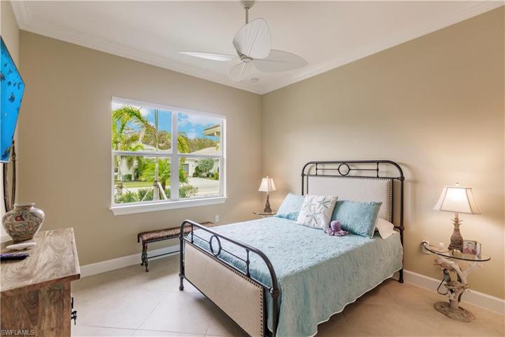 Morning sunrises will greet you in this guest bed.  Every one of these rooms are finished out with low maintenance porcelain tile.  These floor coverings will be here for years to come....YEARS!  It might be necessary to invoke the "fish rule" on your guests as they may never want to leave.  Oh, not sure what the fish rule is?  Simply, after three (3) days throw it out......