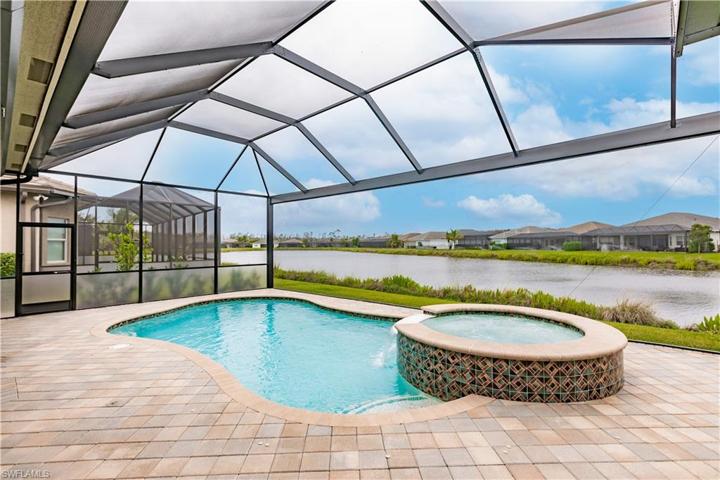 Check out this long lake view through the extra wide picture window screen.  This is a great place to watch the many birds who frequent the waters of Valencia Bonita.