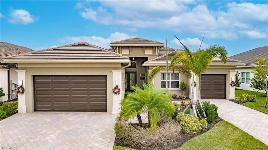 An abundance of curb appeal to go along with the wide footprint of this beauty.  The clubhouse is just a few houses away-