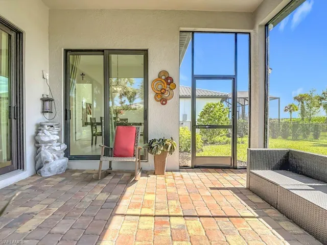 Sunroom / solarium featuring healthy amount of natural light