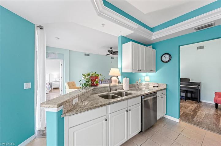 Kitchen Open to Living/Dining Areas