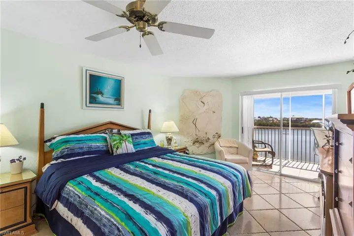 Spacious Primary Bedroom with views of the bay.