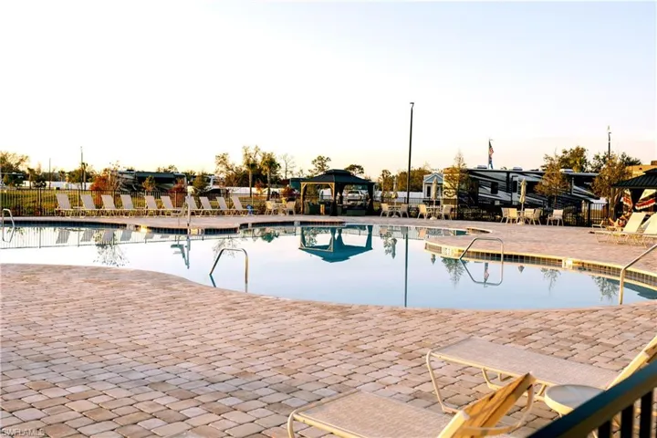 Community pool featuring a gazebo and a patio area