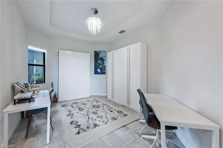Formal dining room - currently used at home schooling room.