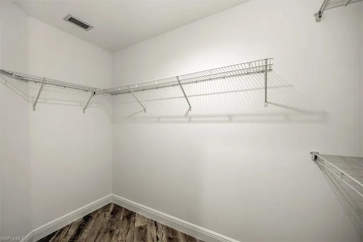 1 of 2 closets in the master. This walk in closet is very big. The other is a regular type closet.
