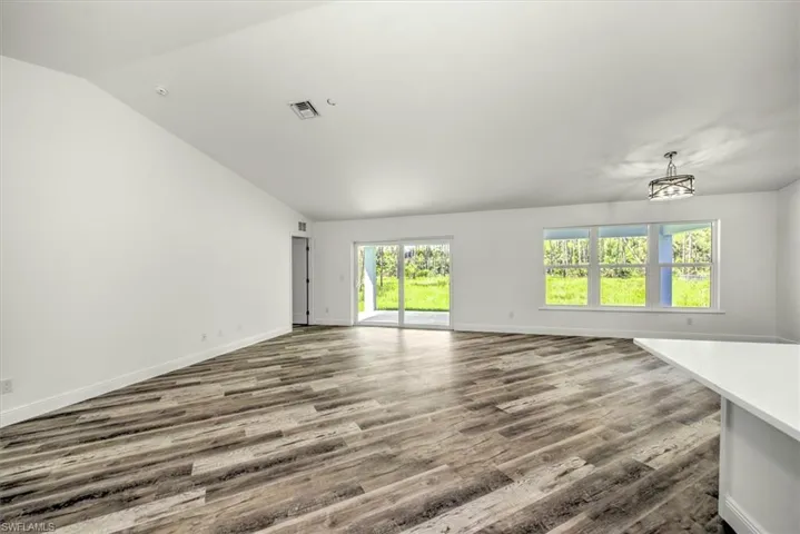 View from the bar toward the family room and dining area to the right.