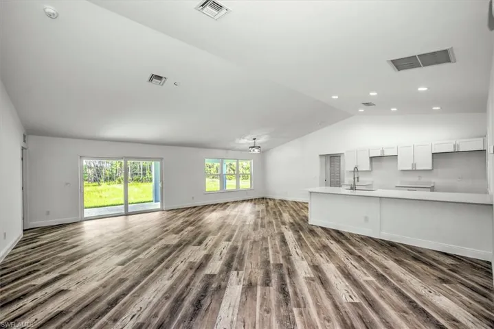 View from the entry. This open floorplan is excellent for a family to enjoy.
