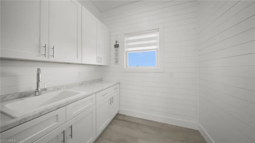 Sink and Cabinets in Laundry Room