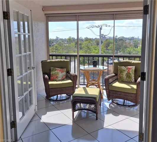 Sunroom featuring a wealth of natural light