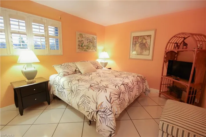 Bedroom with tile patterned flooring