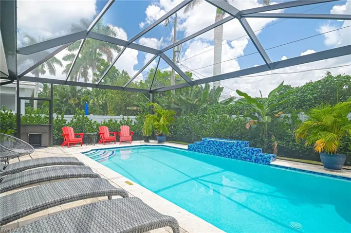 View of swimming pool featuring a patio area and new picture screens