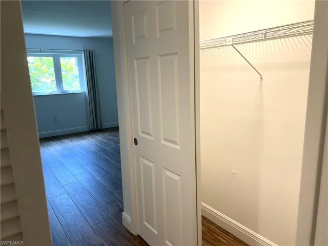 Primary Bedroom - Hall into Primary Suite With Closets on Both Sides of Hall