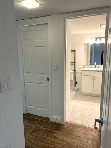 Primary Bedroom - Hall into Primary Suite