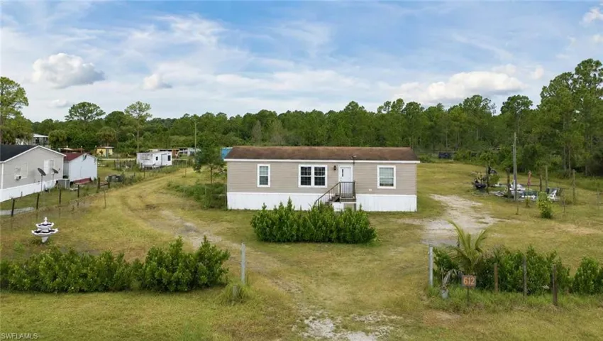 612 Hunting Club Ave, Montura Ranches, Florida 33440