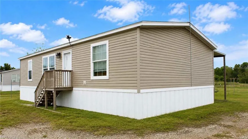 612 Hunting Club Ave, Montura Ranches, Florida 33440