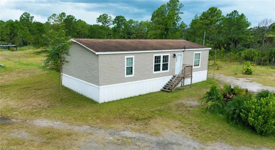 612 Hunting Club Ave, Montura Ranches, Florida 33440