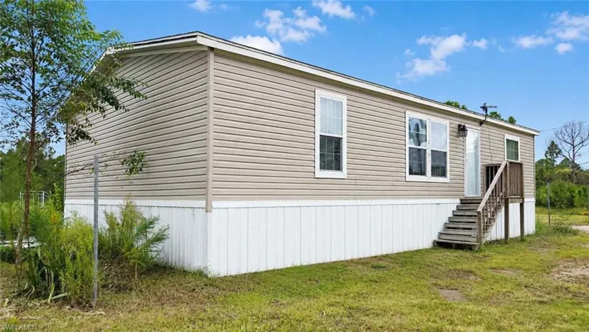 612 Hunting Club Ave, Montura Ranches, Florida 33440