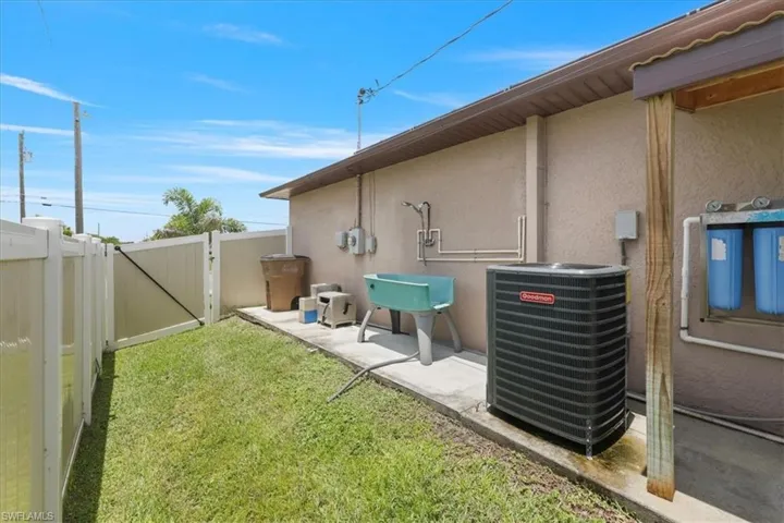 View of yard featuring a gate and a patio