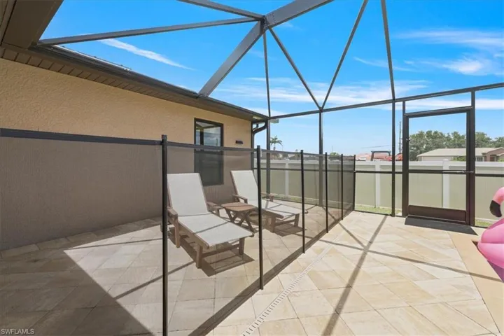 View of patio with glass enclosure