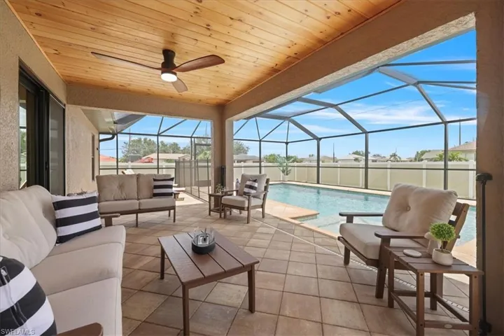 View of patio / terrace with outdoor lounge area, a lanai, and ceiling fan
