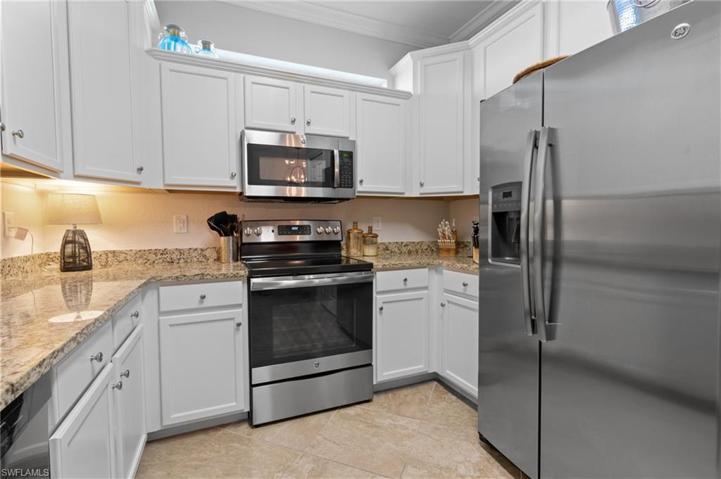 Love the window above the white cabinets