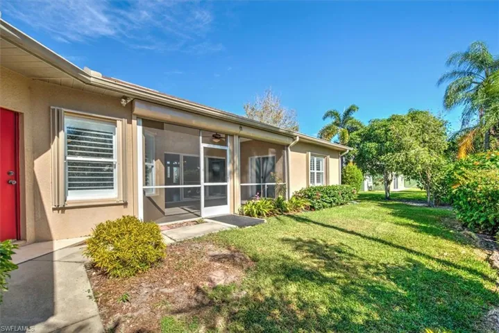 Back of home with exterior entry