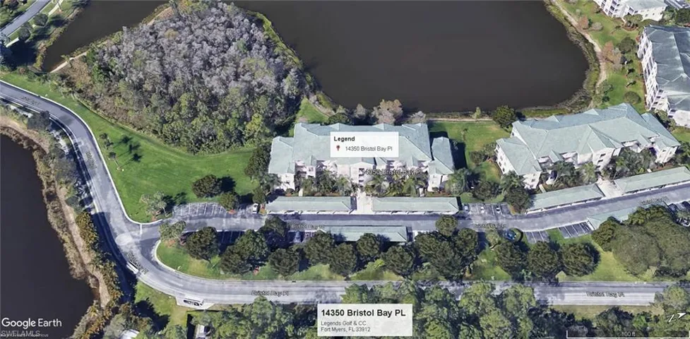 Aerial view of property's location featuring a large body of water