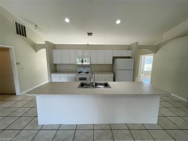 1221  Summa  BLVD, Lehigh Acres, FL 33974