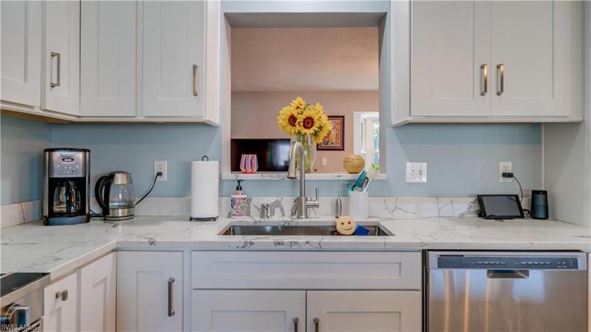 Kitchen with pass thru to Family Room