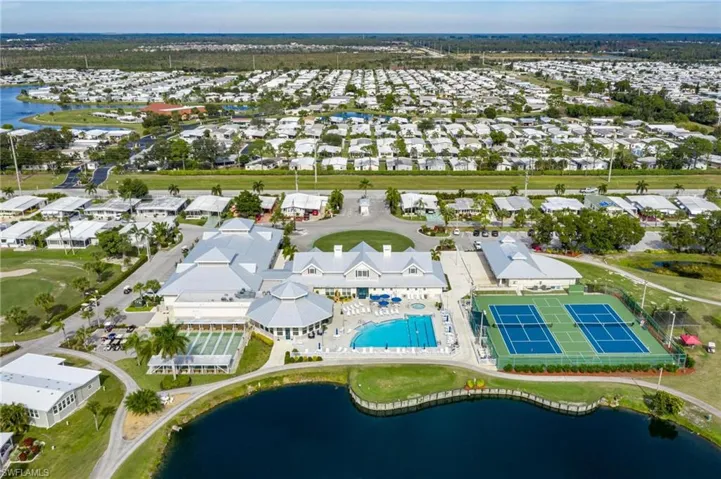Aerial view of a nearby body of water and a pool