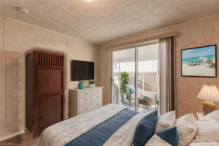 Virtually staged  Bedroom #1 and lanai