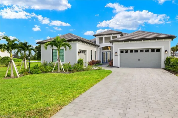 View of front facade featuring 3 car garage