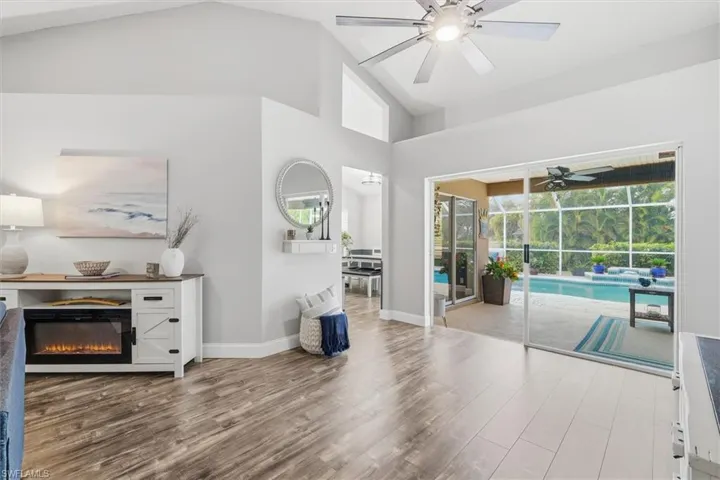 High ceilings with modern fans and luxury plank flooring throughout home!